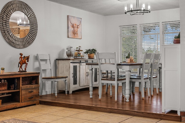 4647 County Road Ff, Orland, CA 95963 - dining room with a chandelier, tile patterned floors, and a textured ceiling