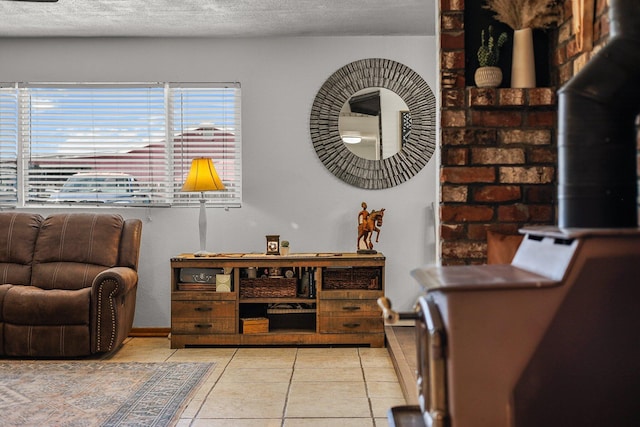4647 County Road Ff, Orland, CA 95963 - sitting room with light tile patterned floors, a textured ceiling, and baseboards