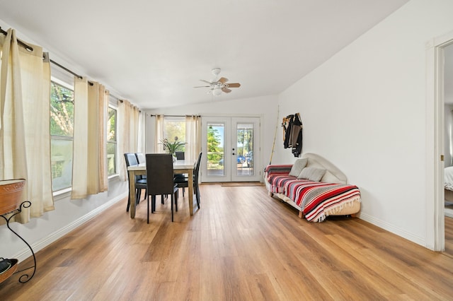 sunroom / solarium featuring a healthy amount of sunlight and french doors
