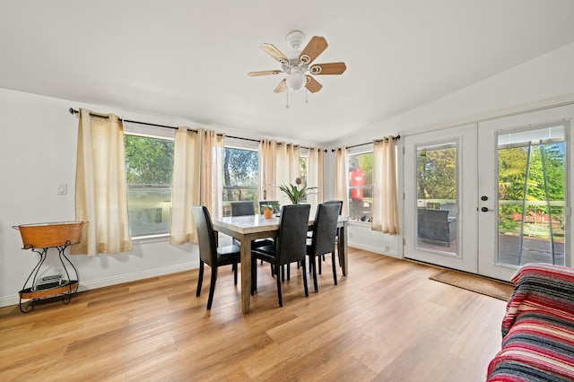 dining space with light wood-type flooring, baseboards, a wealth of natural light, and ceiling fan
