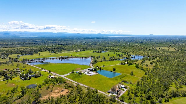 21623 Seven Lakes Ln, Redding, CA 96003 - aerial view featuring a forest view and a water view