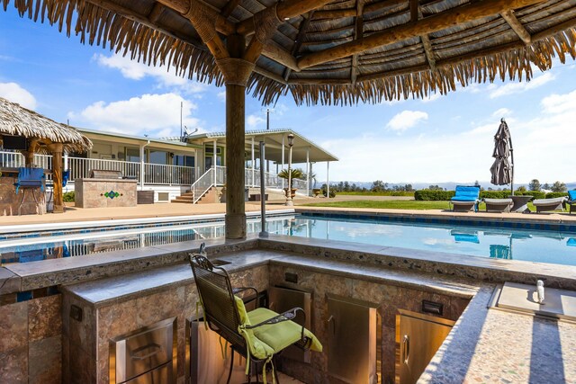 21623 Seven Lakes Ln, Redding, CA 96003 - pool featuring an outdoor bar