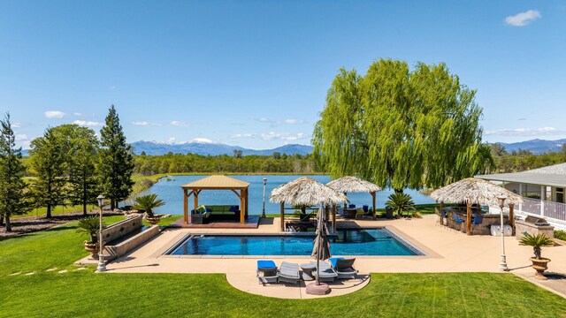 21623 Seven Lakes Ln, Redding, CA 96003 - pool featuring a gazebo, a patio area, and a lawn