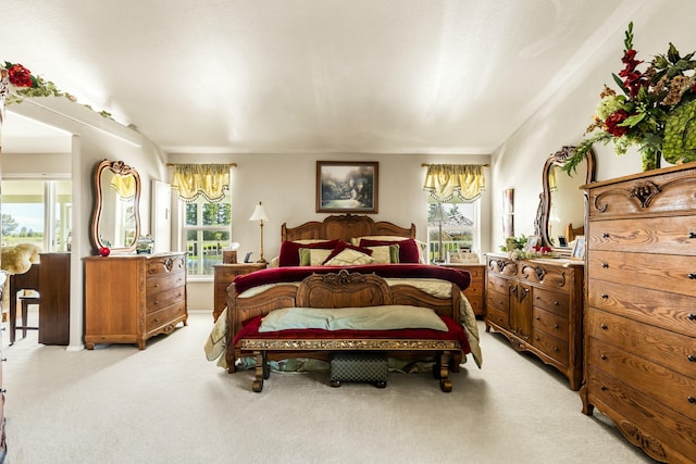 21623 Seven Lakes Ln, Redding, CA 96003 - bedroom with light colored carpet and multiple windows