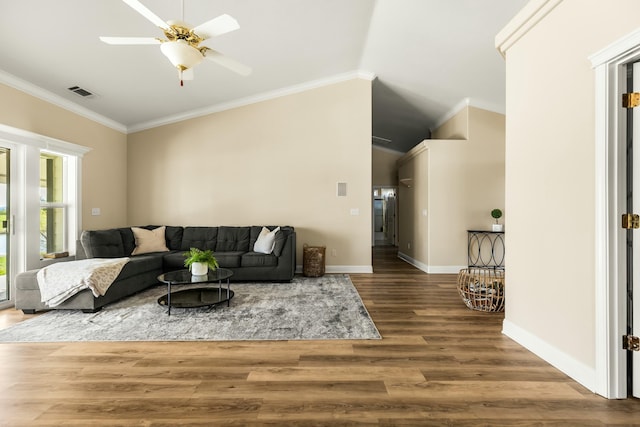 21623 Seven Lakes Ln, Redding, CA 96003 - living room featuring baseboards, visible vents, lofted ceiling, wood finished floors, and crown molding
