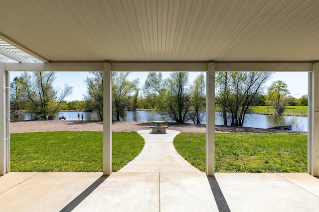 21623 Seven Lakes Ln, Redding, CA 96003 - view of patio / terrace featuring a fire pit and a water view