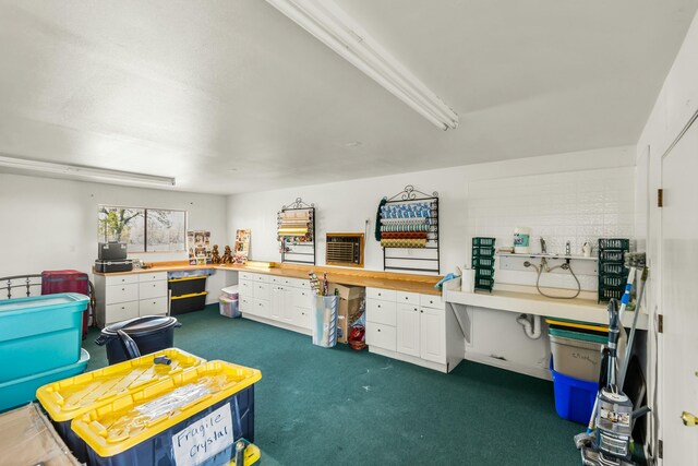 21623 Seven Lakes Ln, Redding, CA 96003 - miscellaneous room with dark colored carpet