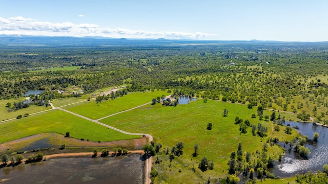 21623 Seven Lakes Ln, Redding, CA 96003 - drone / aerial view with a water and mountain view, a forest view, and a rural view