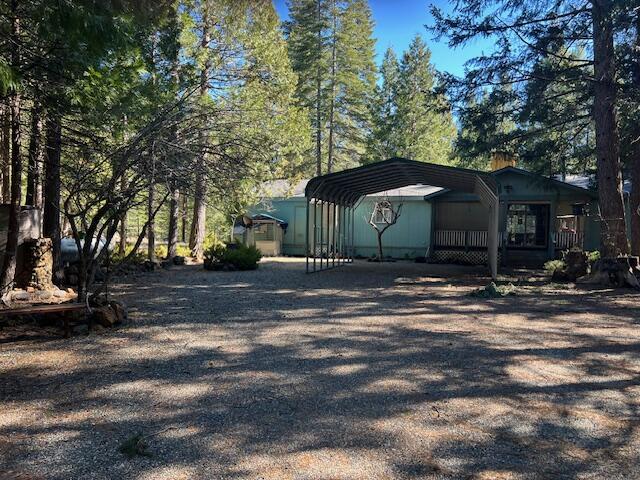 8725 Rocky Mountain Rd, Shingletown, CA 96088 - exterior space with a detached carport