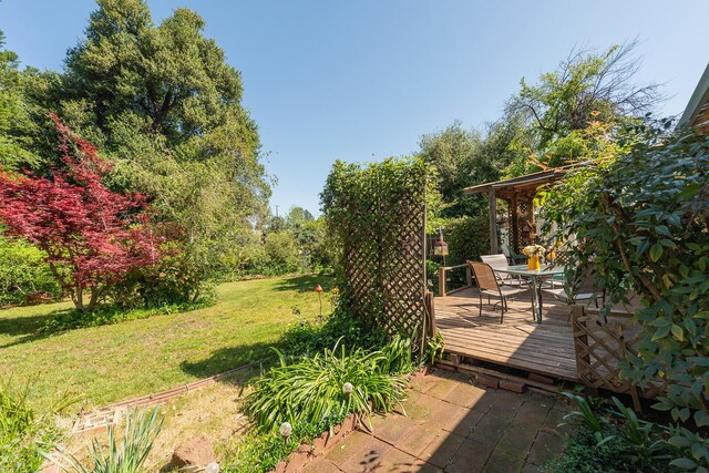 view of yard featuring a deck