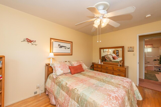 bedroom with wood finished floors and ceiling fan