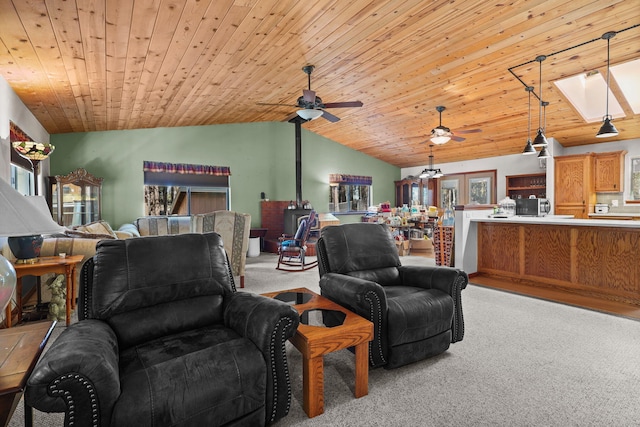 living room featuring wooden ceiling, lofted ceiling, a ceiling fan, and light carpet