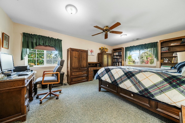 bedroom featuring visible vents and carpet flooring