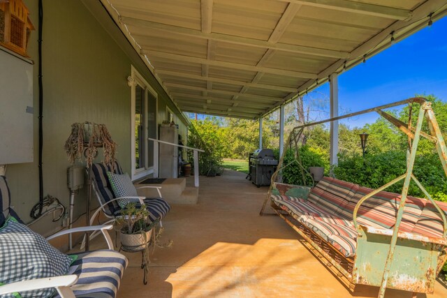 view of patio with a grill