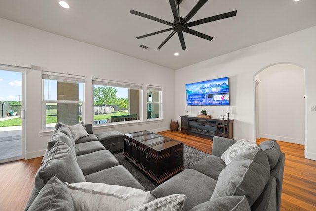 4631 Pleasant Hills Dr, Anderson, CA 96007 - living room with arched walkways, a ceiling fan, visible vents, and a wealth of natural light