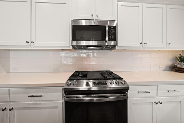 4631 Pleasant Hills Dr, Anderson, CA 96007 - kitchen featuring white cabinets, stainless steel appliances, and light countertops