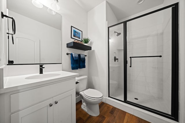 4631 Pleasant Hills Dr, Anderson, CA 96007 - full bath with a shower stall, toilet, vanity, and wood finished floors
