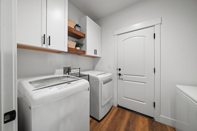 4631 Pleasant Hills Dr, Anderson, CA 96007 - washroom with washing machine and dryer, dark wood-style floors, and cabinet space