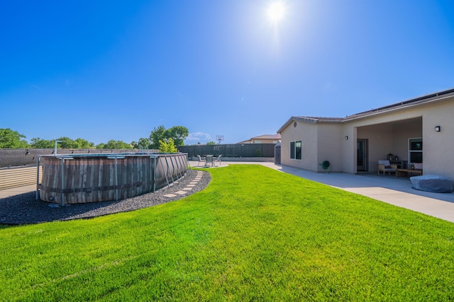 4631 Pleasant Hills Dr, Anderson, CA 96007 - view of yard featuring a fenced in pool, a patio, and fence