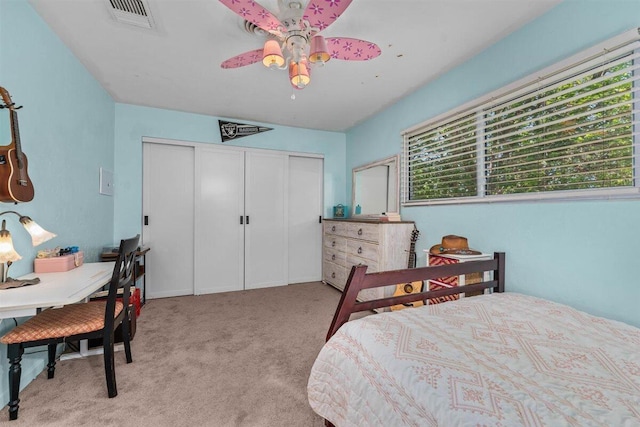 7090 Rio Rancho Rd, Anderson, CA 96007 - bedroom with a closet, visible vents, carpet flooring, and a ceiling fan