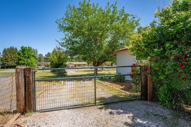 7090 Rio Rancho Rd, Anderson, CA 96007 - view of gate featuring fence