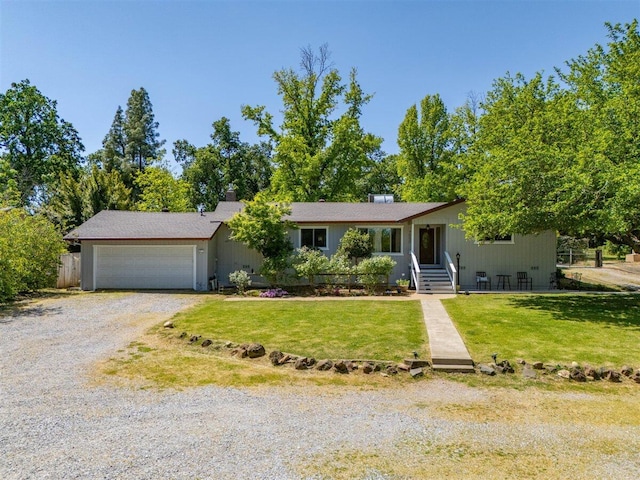 7090 Rio Rancho Rd, Anderson, CA 96007 - ranch-style house with an attached garage, a front yard, and driveway