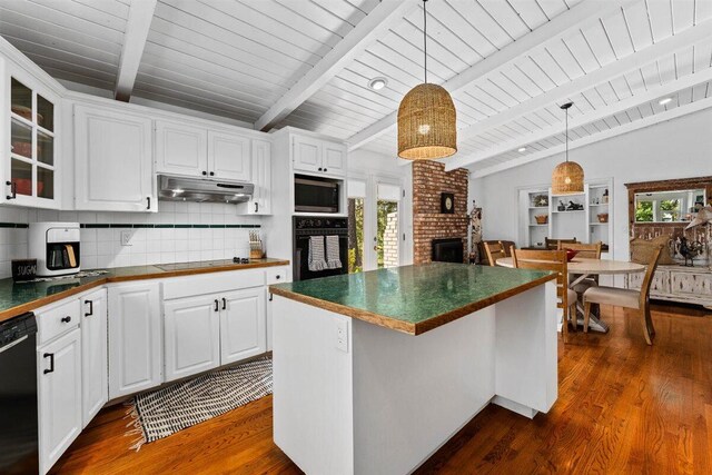 kitchen with dark wood-style floors, under cabinet range hood, dark countertops, wood ceiling, and black appliances