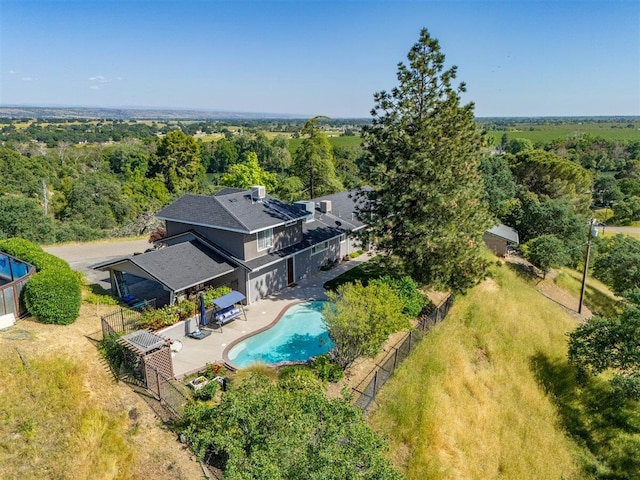 bird's eye view with a view of trees