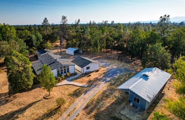 bird's eye view featuring a view of trees