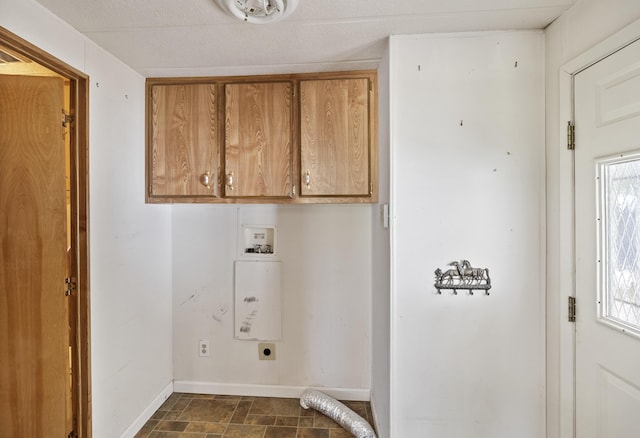 laundry area with baseboards, hookup for an electric dryer, cabinet space, and washer hookup