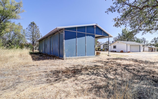 view of outbuilding featuring an outbuilding