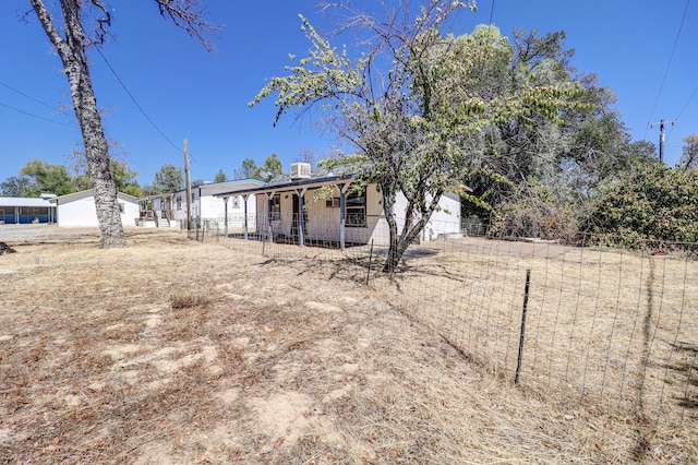 exterior space featuring fence