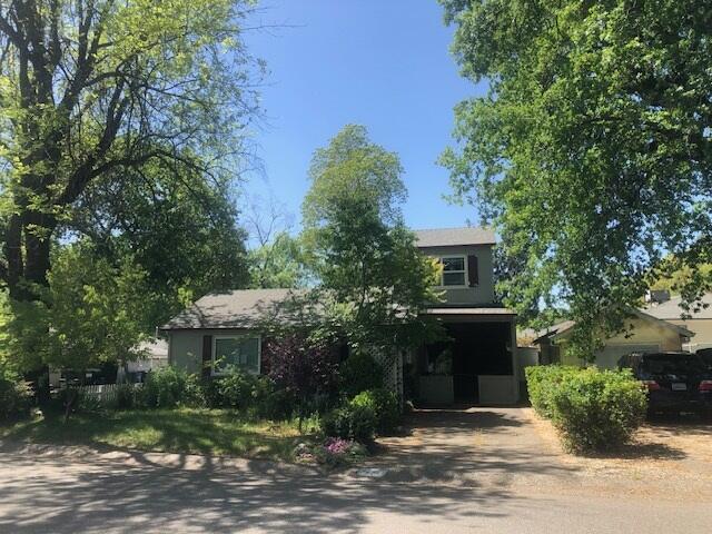 524 Loma St, Redding, CA 96003 - obstructed view of property with driveway
