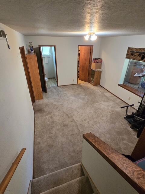 37150 Sapphire Rd, Burney, CA 96013 - staircase with carpet floors and a textured ceiling