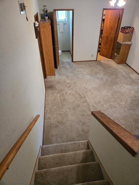 37150 Sapphire Rd, Burney, CA 96013 - staircase featuring carpet floors and baseboards