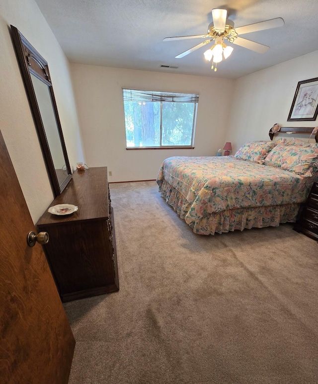 37150 Sapphire Rd, Burney, CA 96013 - bedroom featuring carpet and a ceiling fan