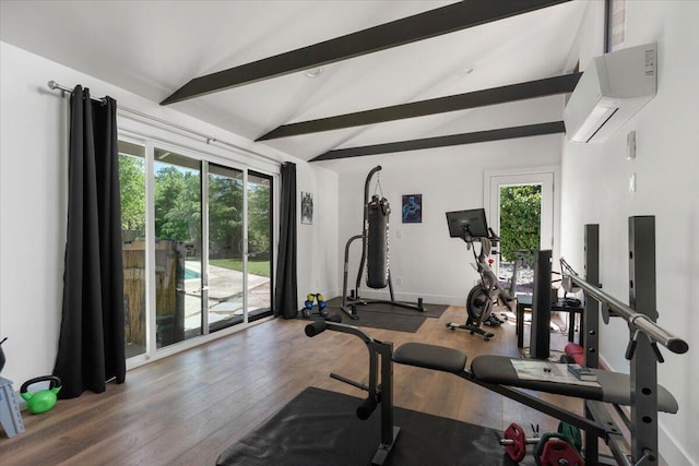 9839 Meadowlark Way, Palo Cedro, CA 96073 - exercise room with vaulted ceiling, wood finished floors, a wall mounted AC, and baseboards