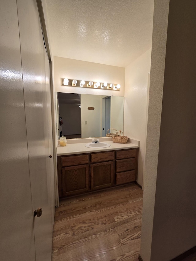 3671 Santa Rosa Way, Redding, CA 96003 - bathroom with wood finished floors and vanity