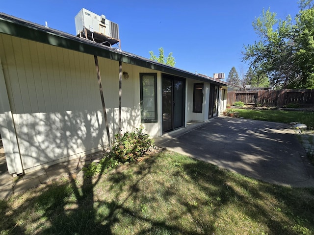 3671 Santa Rosa Way, Redding, CA 96003 - rear view of house with fence, a yard, and a patio