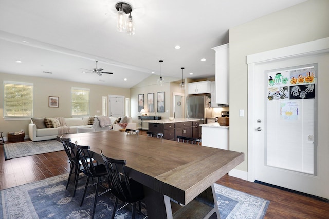 22070 Lassen View Dr, Palo Cedro, CA 96073 - dining room featuring dark wood finished floors, lofted ceiling, baseboards, and ceiling fan