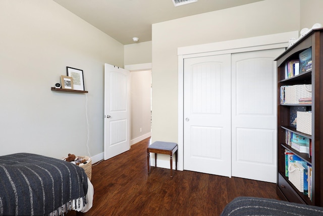 22070 Lassen View Dr, Palo Cedro, CA 96073 - bedroom with wood finished floors, a closet, baseboards, and visible vents