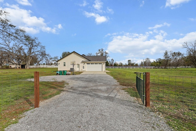 22070 Lassen View Dr, Palo Cedro, CA 96073 - view of front of property with an attached garage, driveway, fence, and a front yard