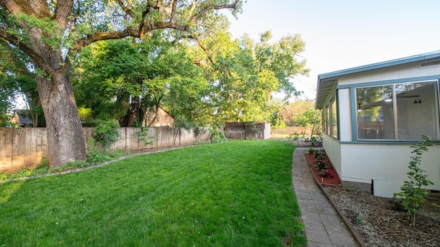 view of yard featuring a fenced backyard