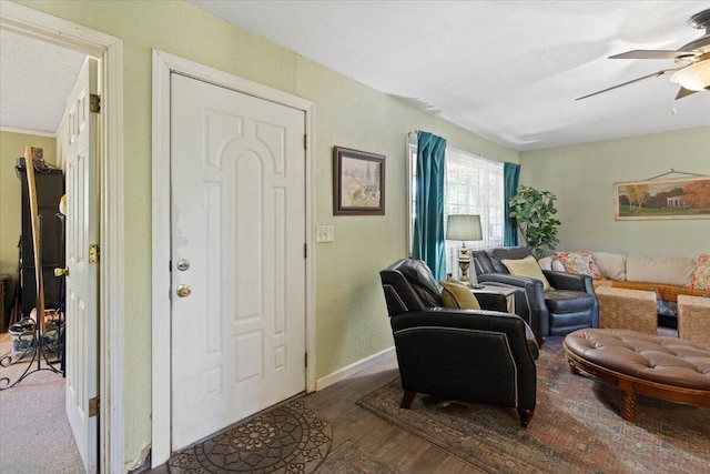19715 Reed Rd, Cottonwood, CA 96022 - living area featuring ceiling fan, wood finished floors, and baseboards