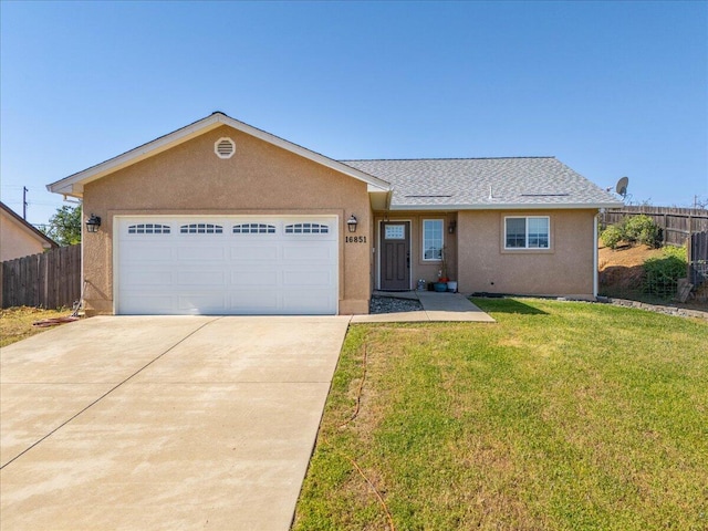 16851 Cape Cod Dr, Redding, CA 96003 - single story home with concrete driveway, stucco siding, an attached garage, and roof with shingles