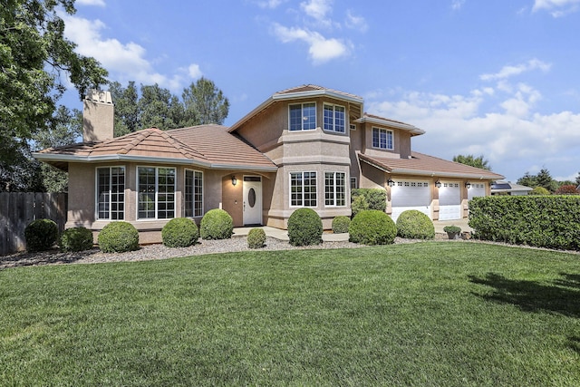 20340 Greenview Dr, Redding, CA 96002 - view of front facade with stucco siding, a chimney, a tiled roof, and a garage