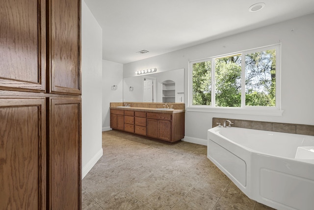20340 Greenview Dr, Redding, CA 96002 - full bath with a bath, double vanity, and baseboards