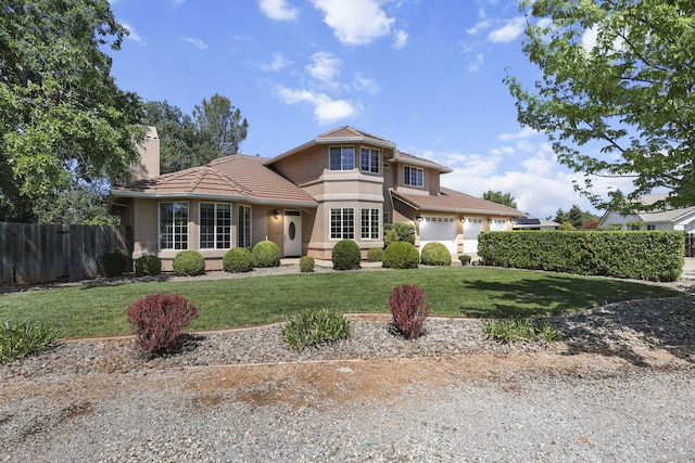 20340 Greenview Dr, Redding, CA 96002 - view of front facade featuring a garage, a tile roof, a chimney, and stucco siding