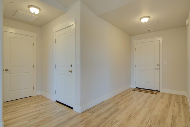 3503 Americana Way, Redding, CA 96003 - foyer featuring baseboards, light wood-style floors, and visible vents