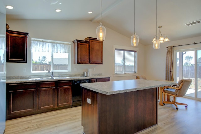 3503 Americana Way, Redding, CA 96003 - kitchen featuring light wood-style flooring, a sink, visible vents, and vaulted ceiling with beams